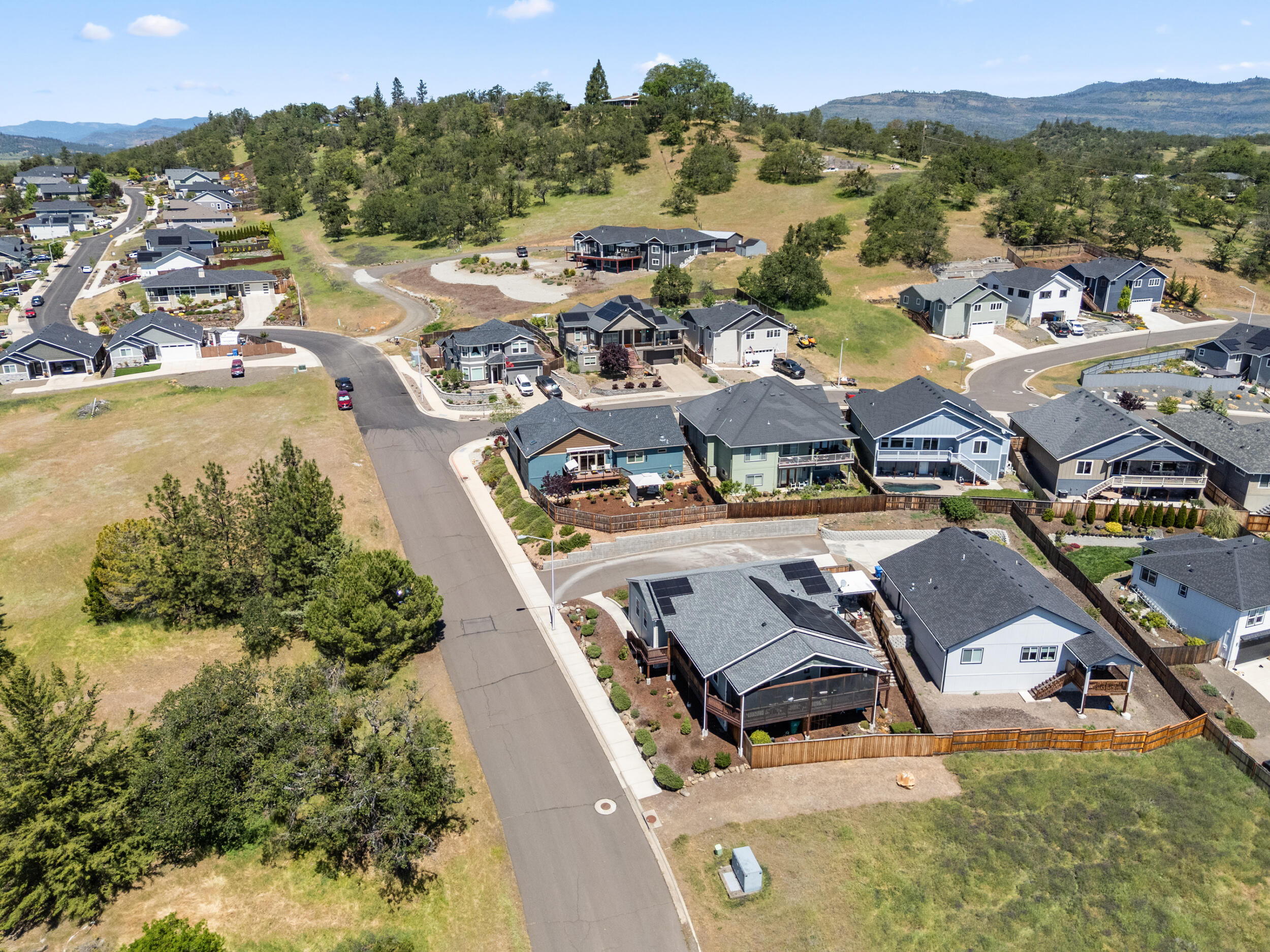1008 Azure Way Eagle Point, OR 97524 - Photo 49 of 59 an aerial view of a house with a garden