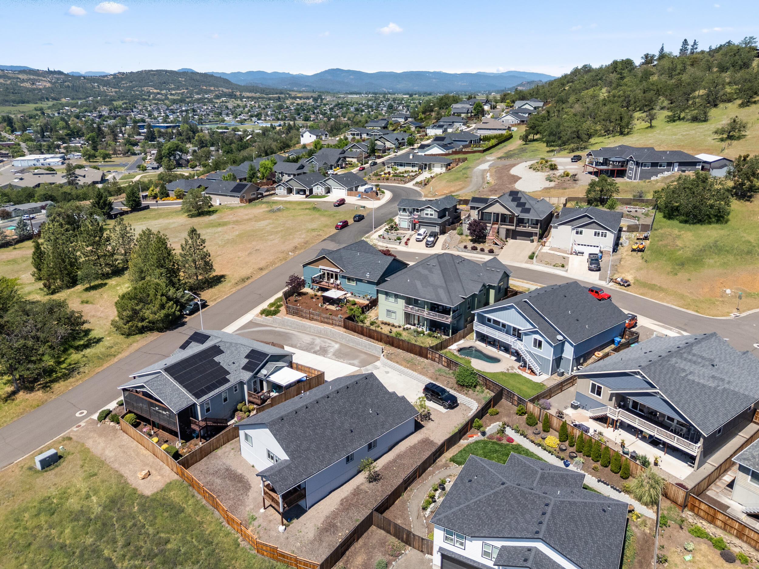 1008 Azure Way Eagle Point, OR 97524 - Photo 50 of 59 an aerial view of residential houses with outdoor space