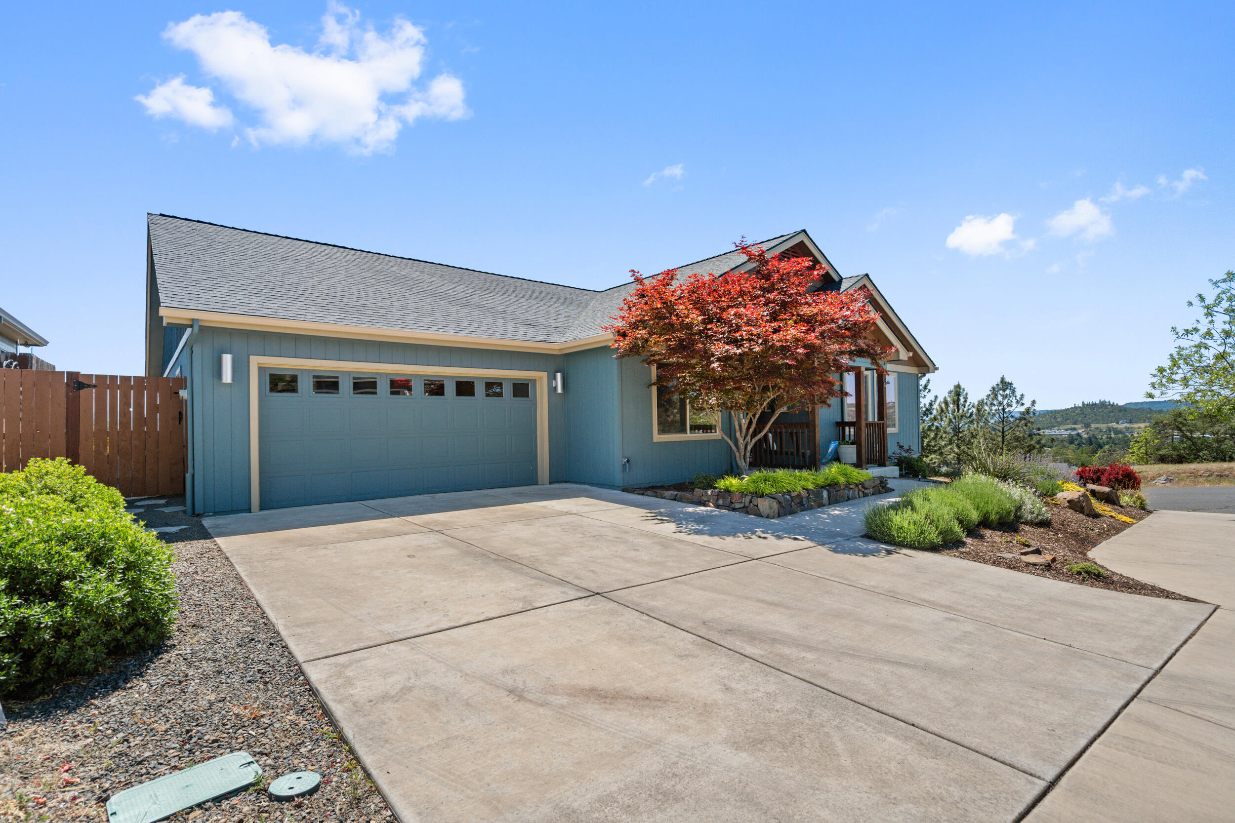 1008 Azure Way Eagle Point, OR 97524 - Photo 5 of 59 a house view with a garden space