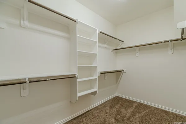 a view of a room with racks on the wall