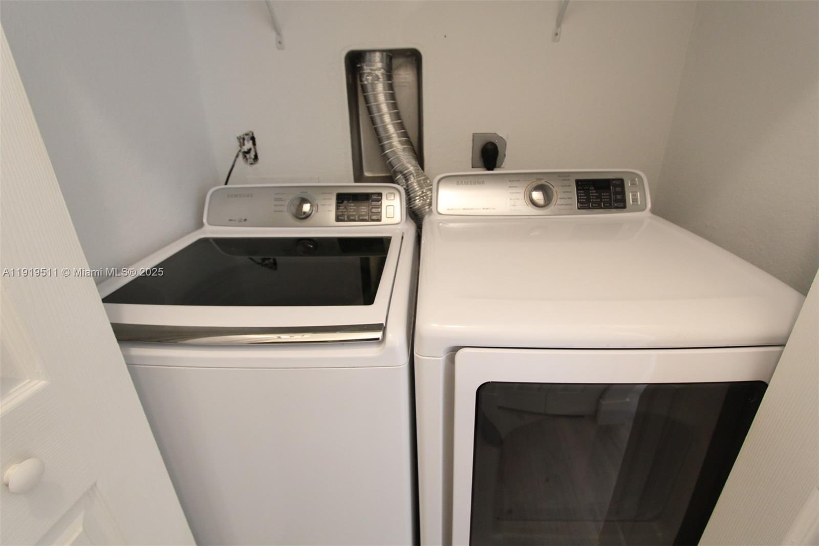 9390 Southwest 222nd Way, Unit 9390 Cutler Bay, FL 33190 - Photo 28 of 32 a utility room with dryer and washer