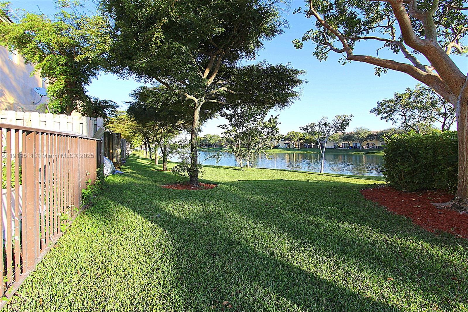 9390 Southwest 222nd Way, Unit 9390 Cutler Bay, FL 33190 - Photo 30 of 32 a view of a park with a tree