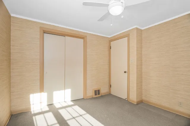 a view of a room with windows