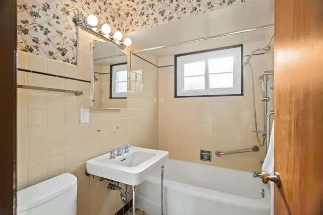 a bathroom with a sink and a bathtub