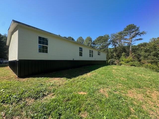 236 Wash Wilson Loop Blue Ridge, GA 30513 - Photo 20 of 22 a view of house with backyard