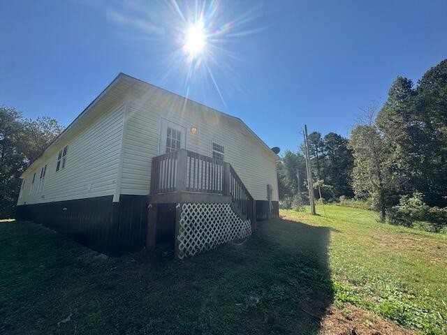 236 Wash Wilson Loop Blue Ridge, GA 30513 - Photo 21 of 22 a view of a house with a yard