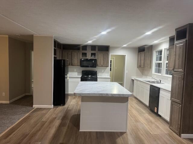 236 Wash Wilson Loop Blue Ridge, GA 30513 - Photo 5 of 22 a large kitchen with stainless steel appliances kitchen island a large counter top and a refrigerator