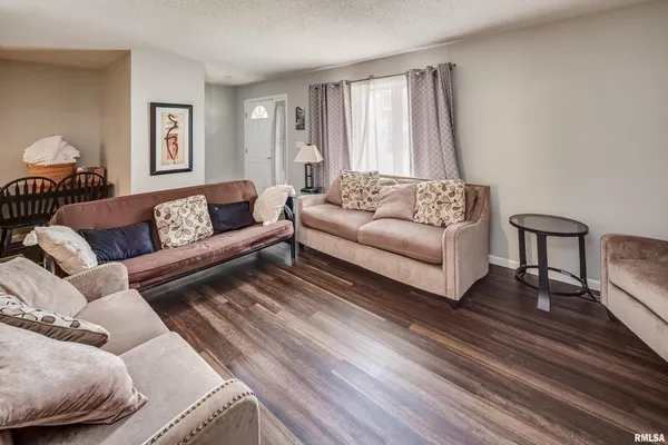 a living room with furniture and a couch