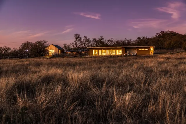 a view of a lake and sunset