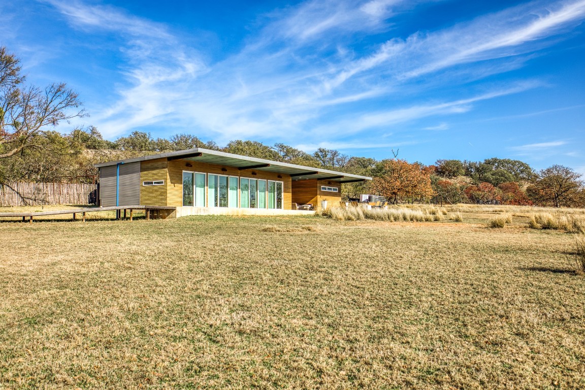 2969 County Road 422 Talpa, TX 76882 - Photo 23 of 40 a big house with swimming pool in front of it