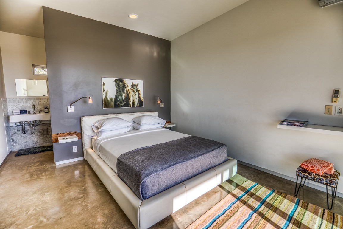 2969 County Road 422 Talpa, TX 76882 - Photo 25 of 40 a bedroom with a bed and window