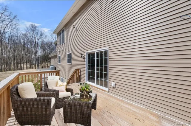 a bathroom with a sink vanity granite and toilet