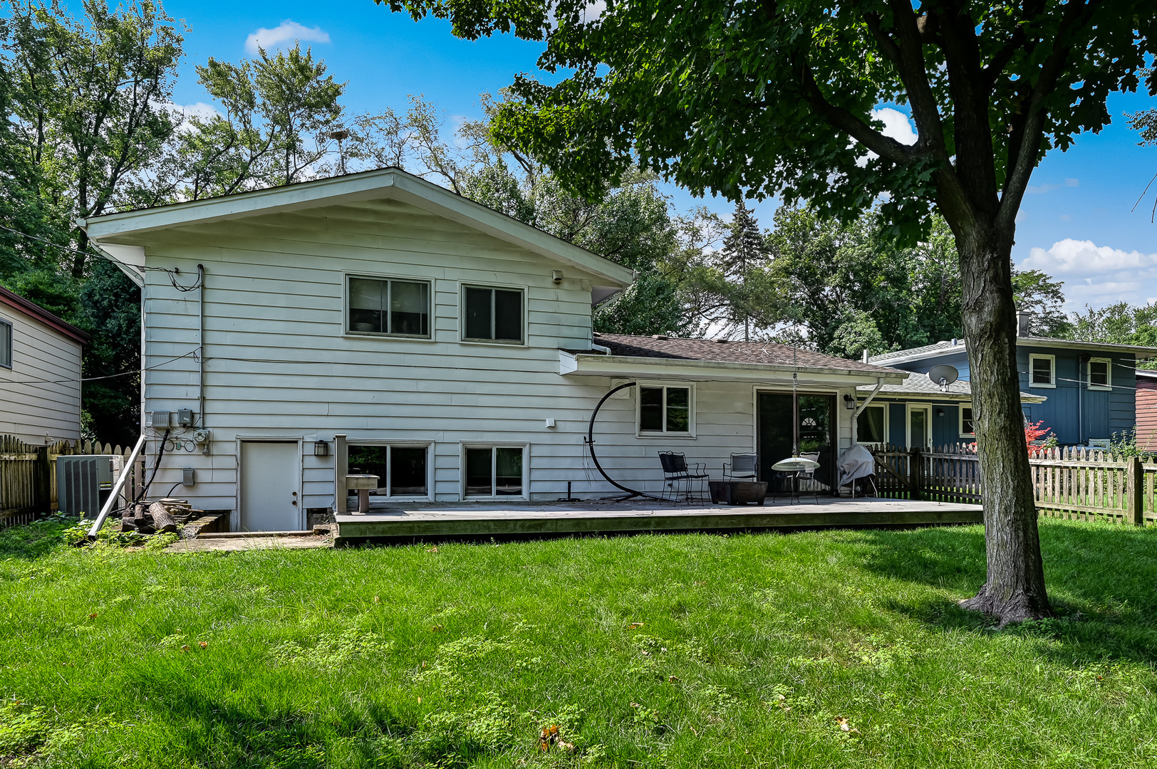 440 East Naperville Road Clarendon Hills, IL 60514 - Photo 18 of 23 a front view of house with yard and outdoor seating