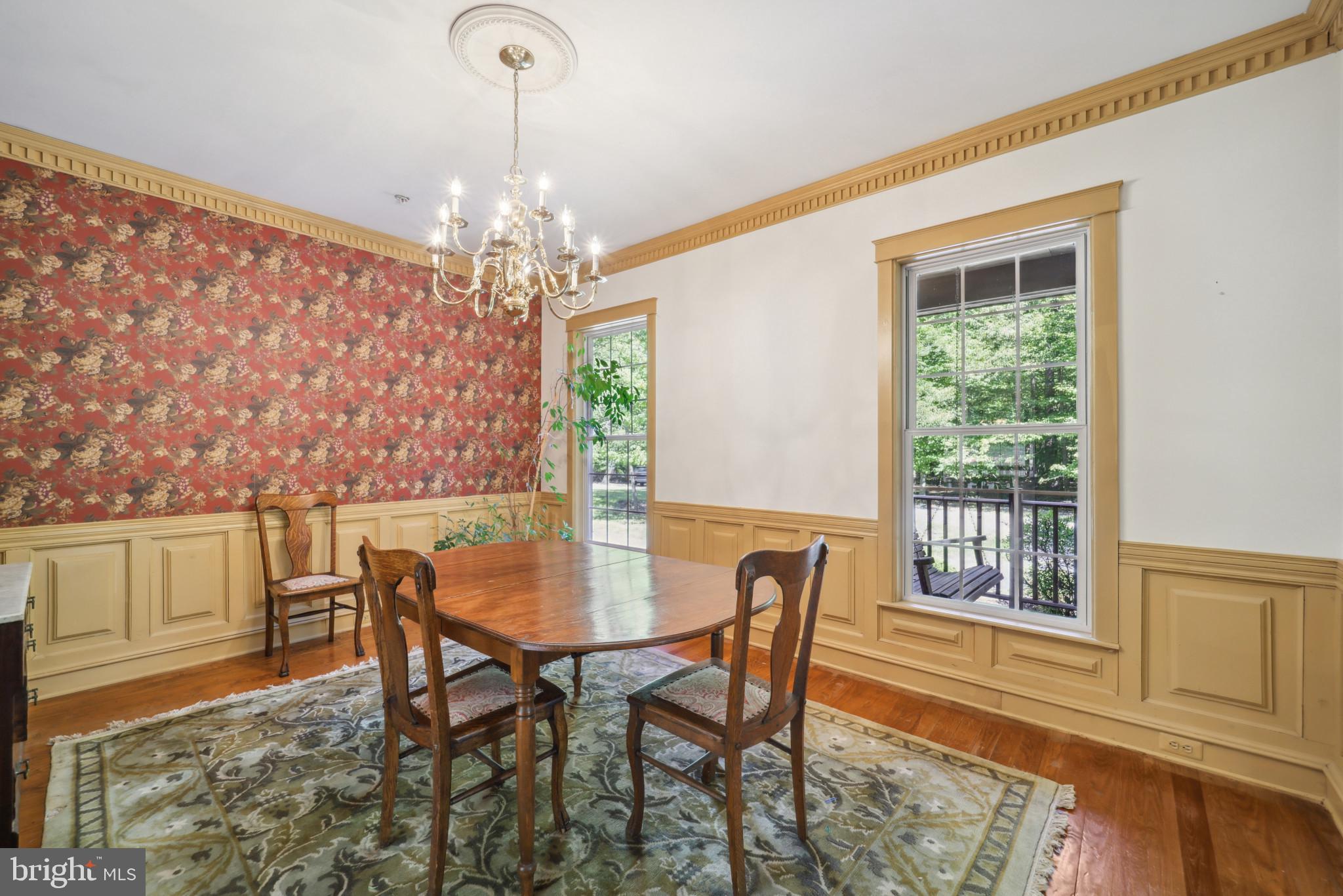 15003 Reserve Road Accokeek, MD 20607 - Photo 7 of 40 Spacious DR with wainscotting & crown molding