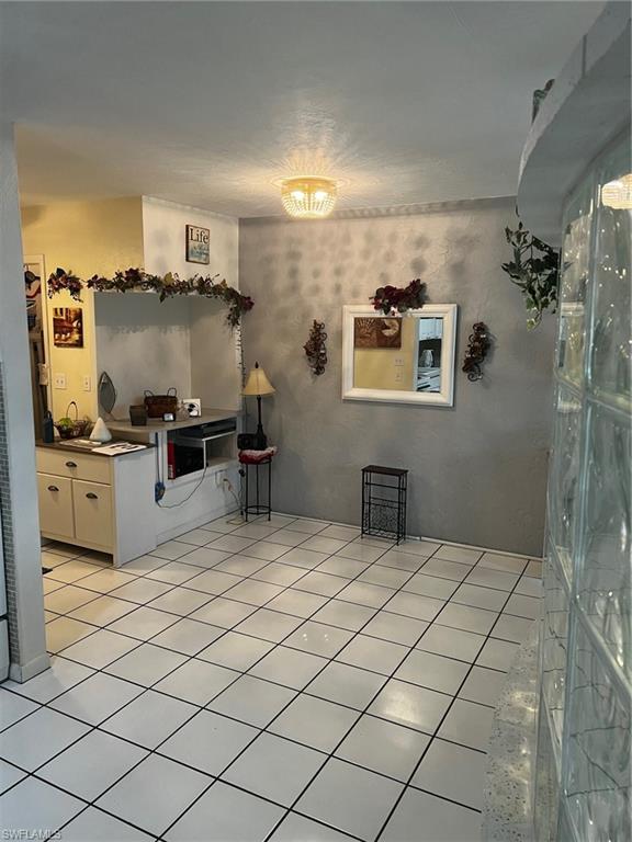 828 Wiggins Pass Road, Unit 5 Naples, FL 34110 - Photo 9 of 21 Gallery Image 9