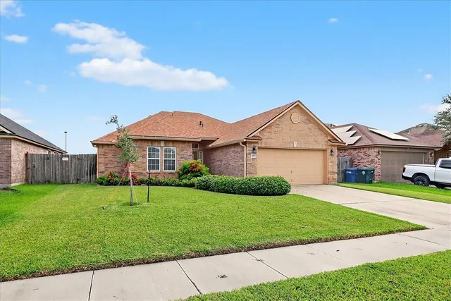 a front view of house with yard