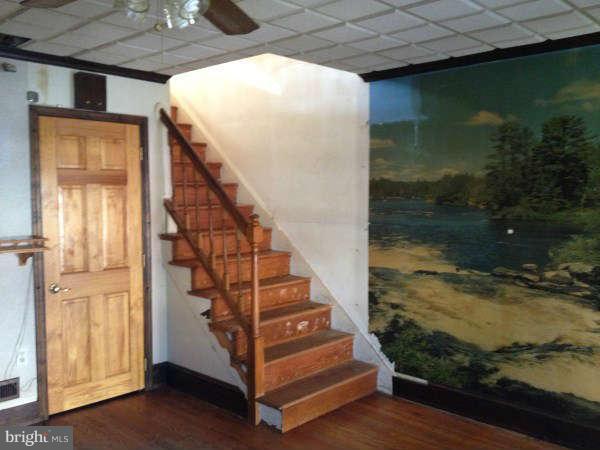 106 Riverthorn Road Baltimore, MD 21220 - Photo 3 of 18 a view of entryway with wooden floor