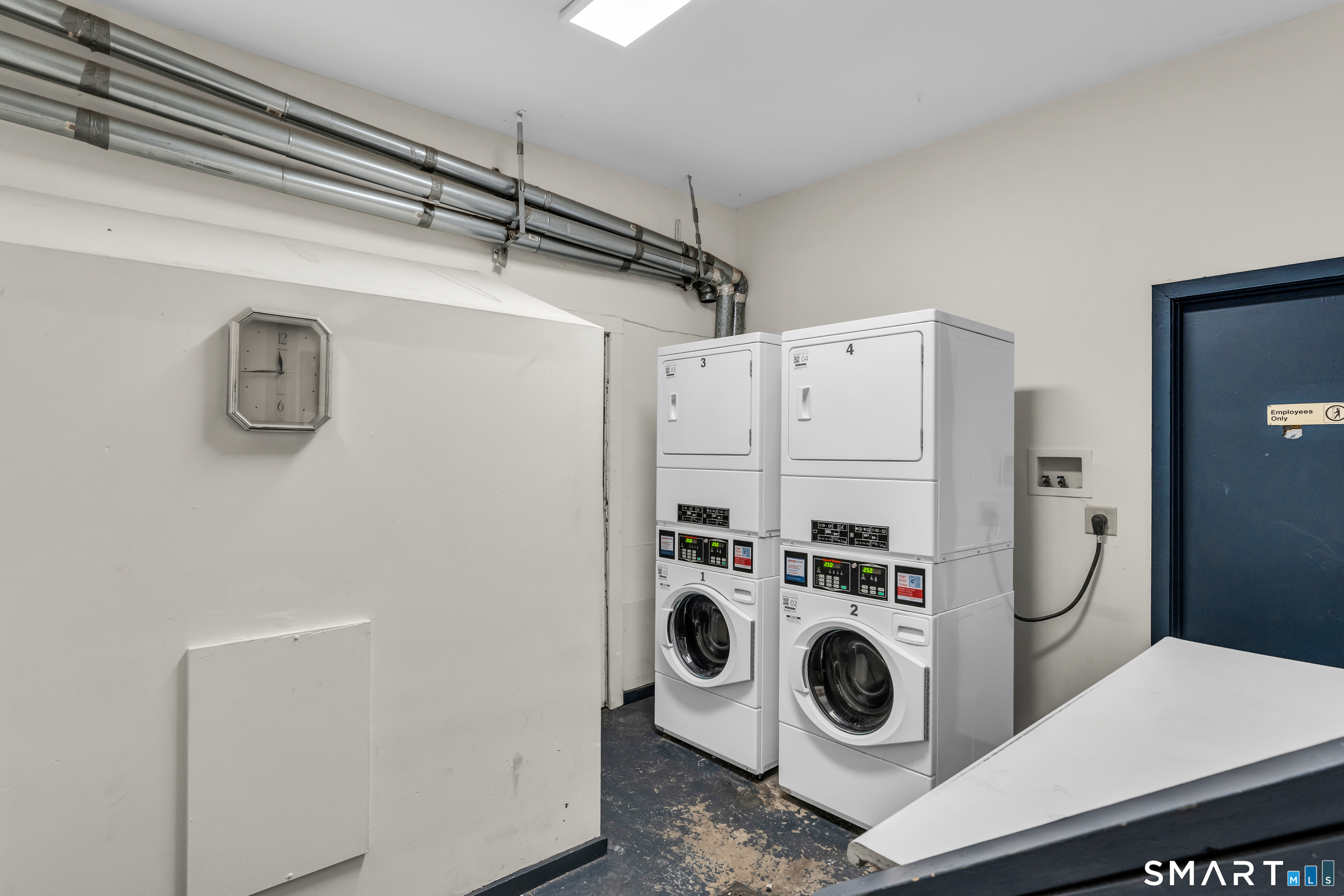 144 East Main Street, Unit 5 Clinton, CT 06413 - Photo 14 of 19 a utility room with dryer and washer
