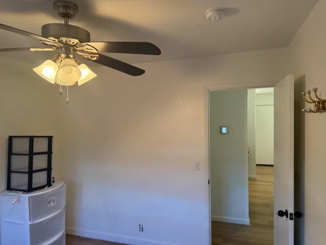 a bathroom with a toilet and a tub