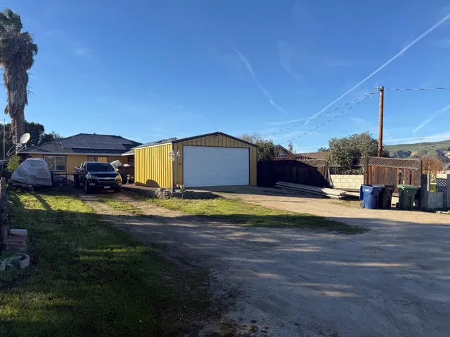 a view of a house with a swimming pool