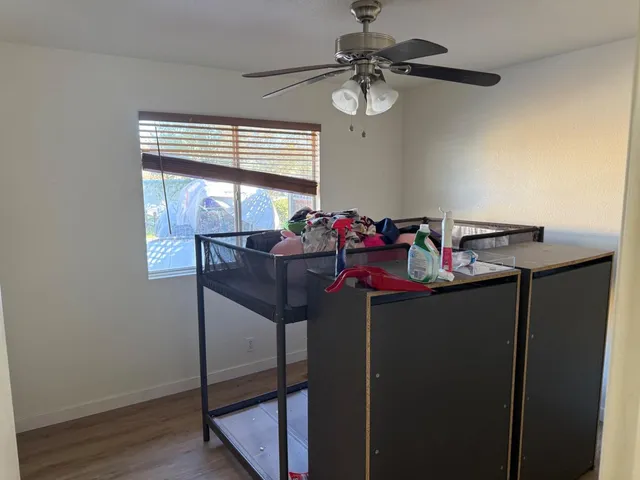 a bedroom with furniture and a bed