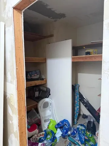 a room with storage and utility