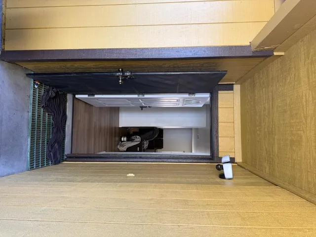 a view of room with two chairs