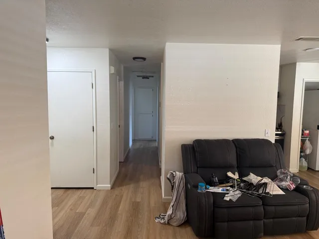 a living room with furniture and a couch