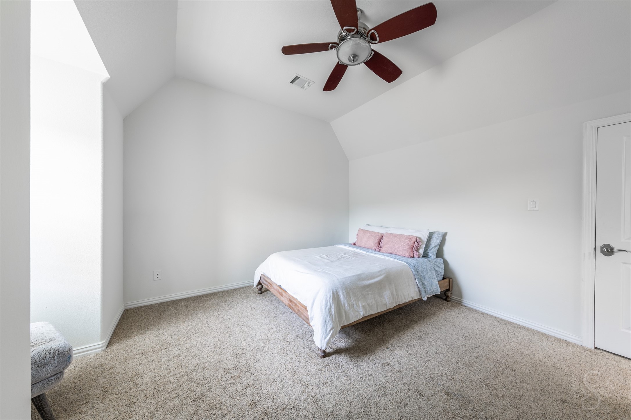 28602 Hoffman Spring Lane Fulshear, TX 77441 - Photo 33 of 49 Secondary bedroom features plush carpeting, a ceiling fan, and plantation shutters for a clean, comfortable setting. The layout easily accommodates full bedroom furnishings along with a desk or study area,Well-proportioned secondary bedroom features plush carpeting, a ceiling fan, and plantation shutters for a clean, comfortable setting. The layout easily accommodates full bedroom furnishings along with a desk or study area, and includes access to a private full bath.