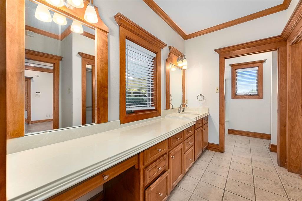 11631 Hiram Road Wills Point, TX 75169 - Photo 14 of 29 a bathroom with a sink and a mirror