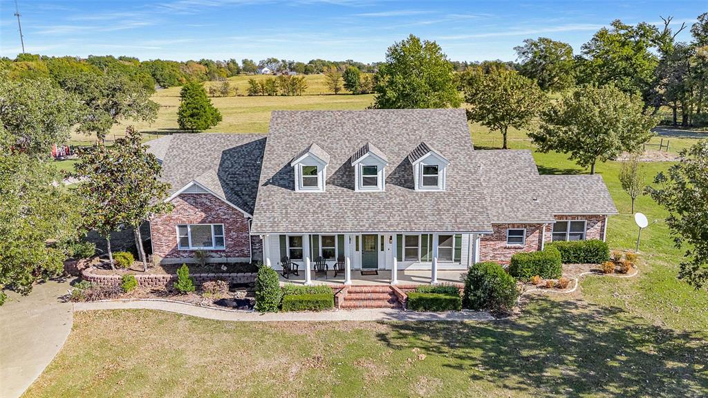 11631 Hiram Road Wills Point, TX 75169 - Photo 26 of 29 front view of a house with a yard
