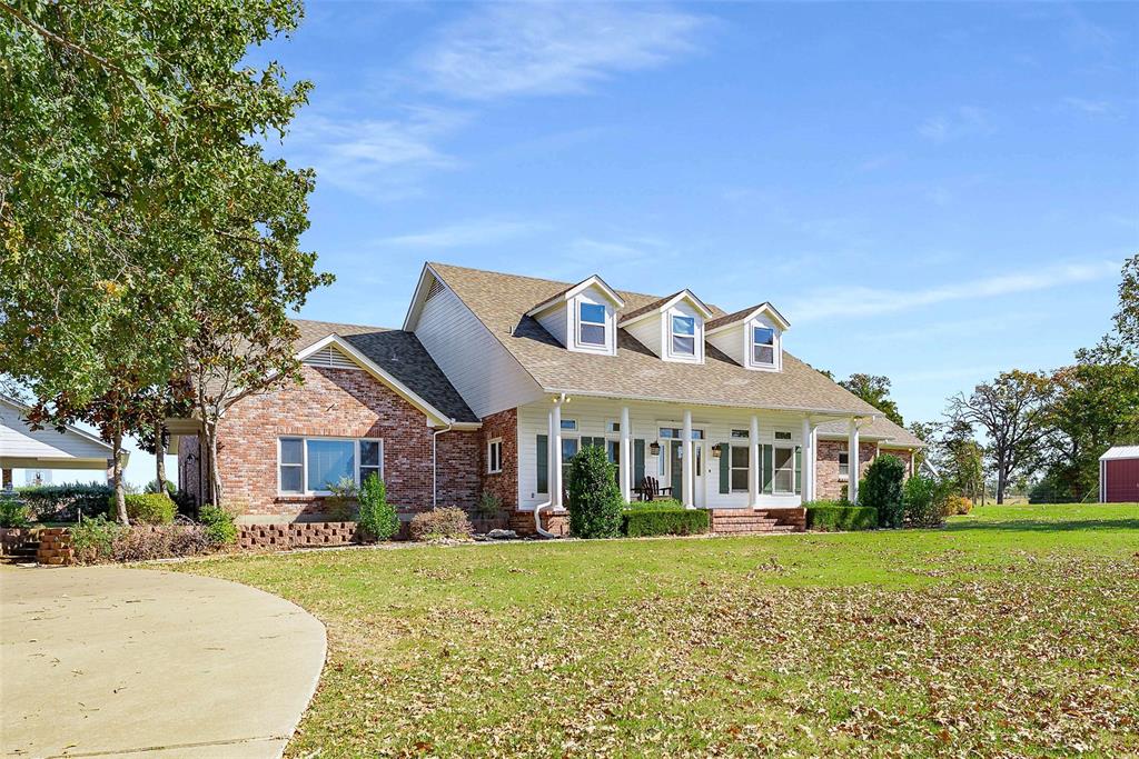 11631 Hiram Road Wills Point, TX 75169 - Photo 3 of 29 front view of a house with a yard