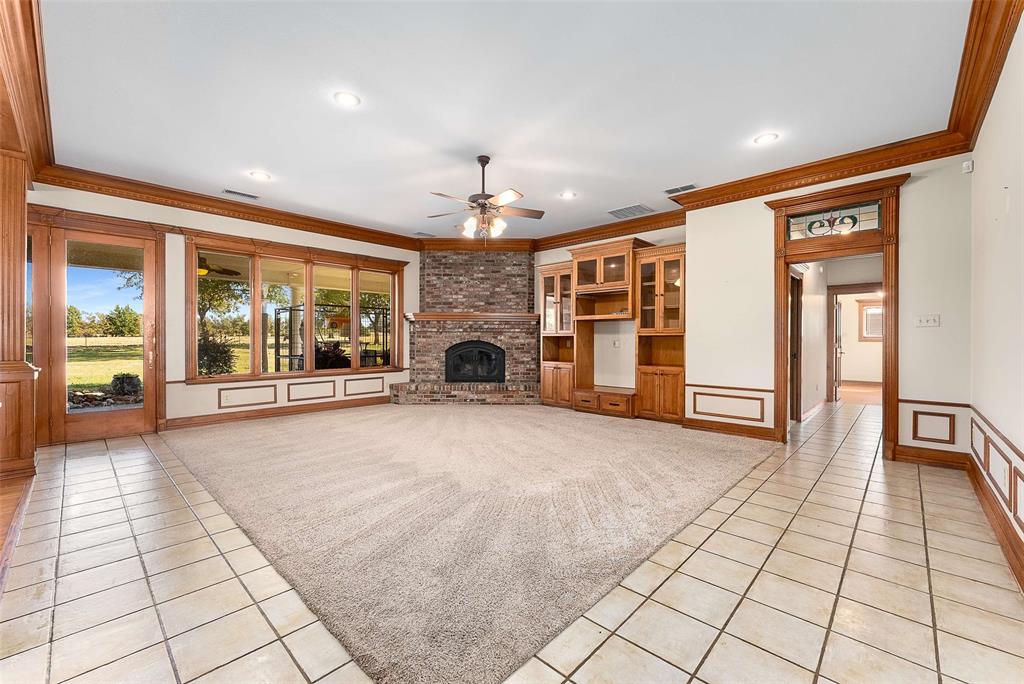 11631 Hiram Road Wills Point, TX 75169 - Photo 6 of 29 a big room with chandelier fan and windows