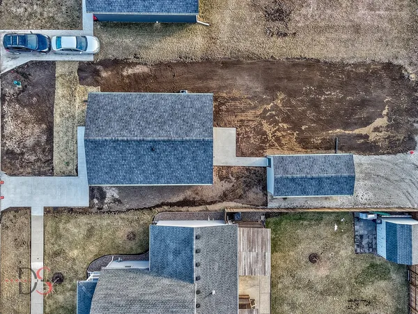 a house view with a backyard space