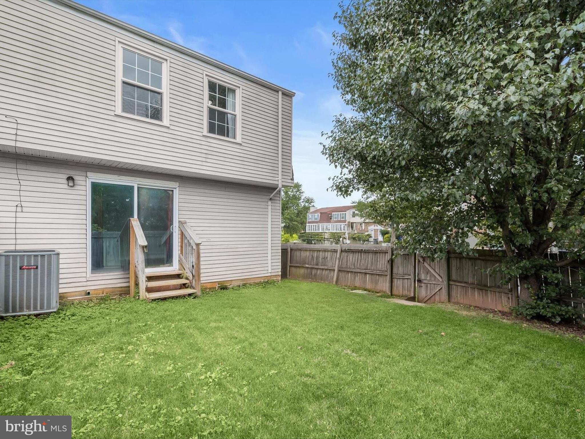 17617 Kohlhoss Road Poolesville, MD 20837 - Photo 44 of 48 a view of a house with backyard and a tree