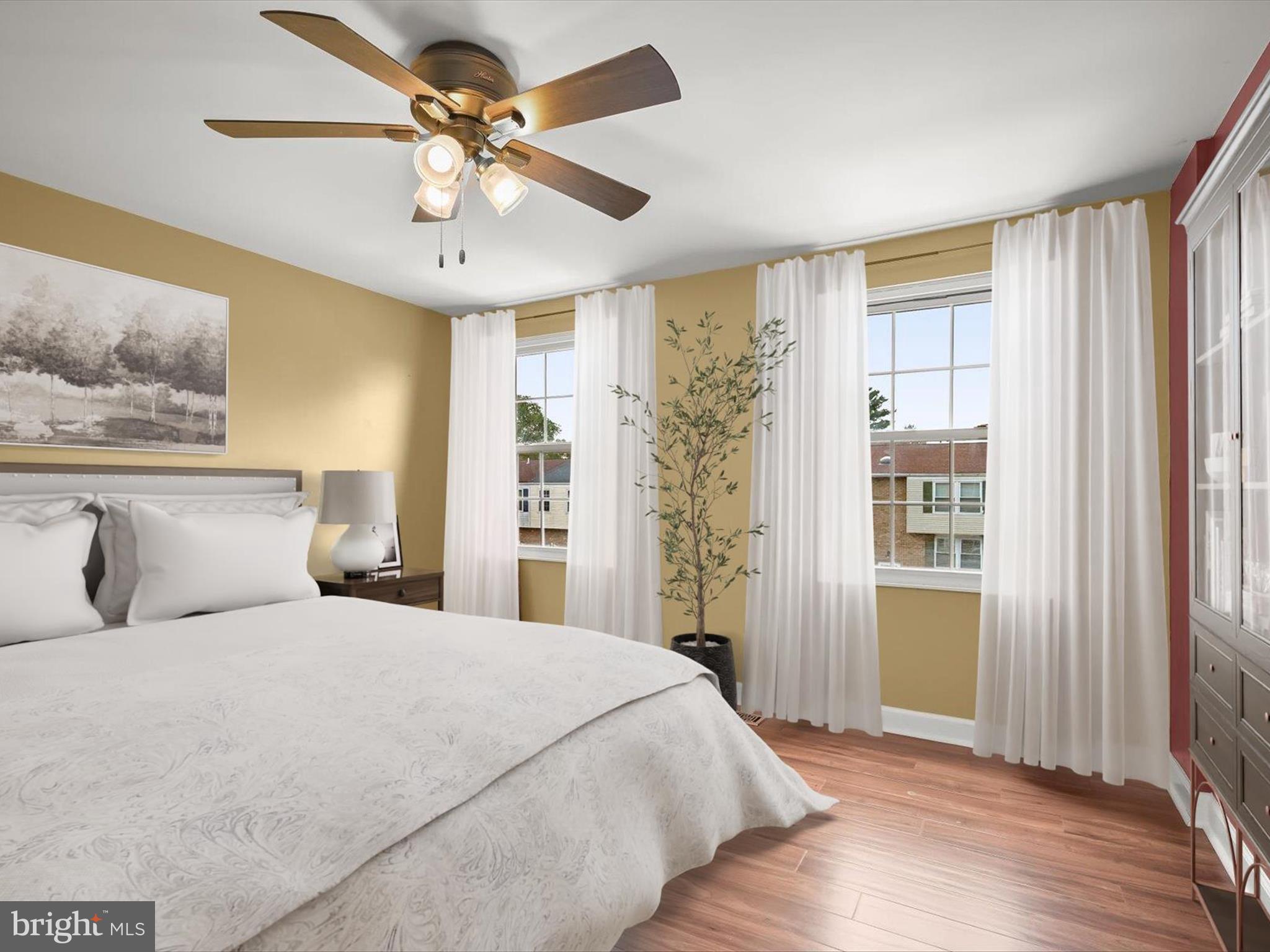 17617 Kohlhoss Road Poolesville, MD 20837 - Photo 5 of 48 a spacious bedroom with a bed and a window
