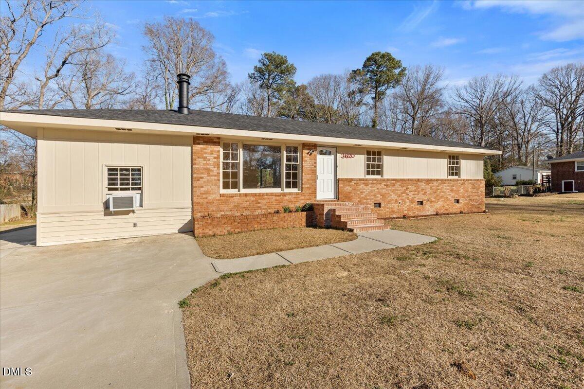 3620 Oates Drive Raleigh, NC 27604 - Photo 2 of 26 a view of a house with a snow in the yard