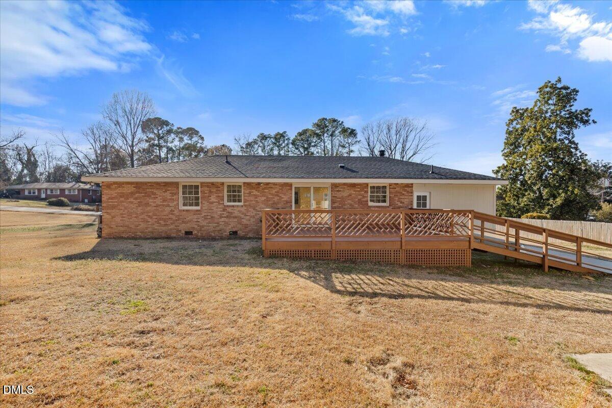 3620 Oates Drive Raleigh, NC 27604 - Photo 25 of 26 a view of a house with a yard