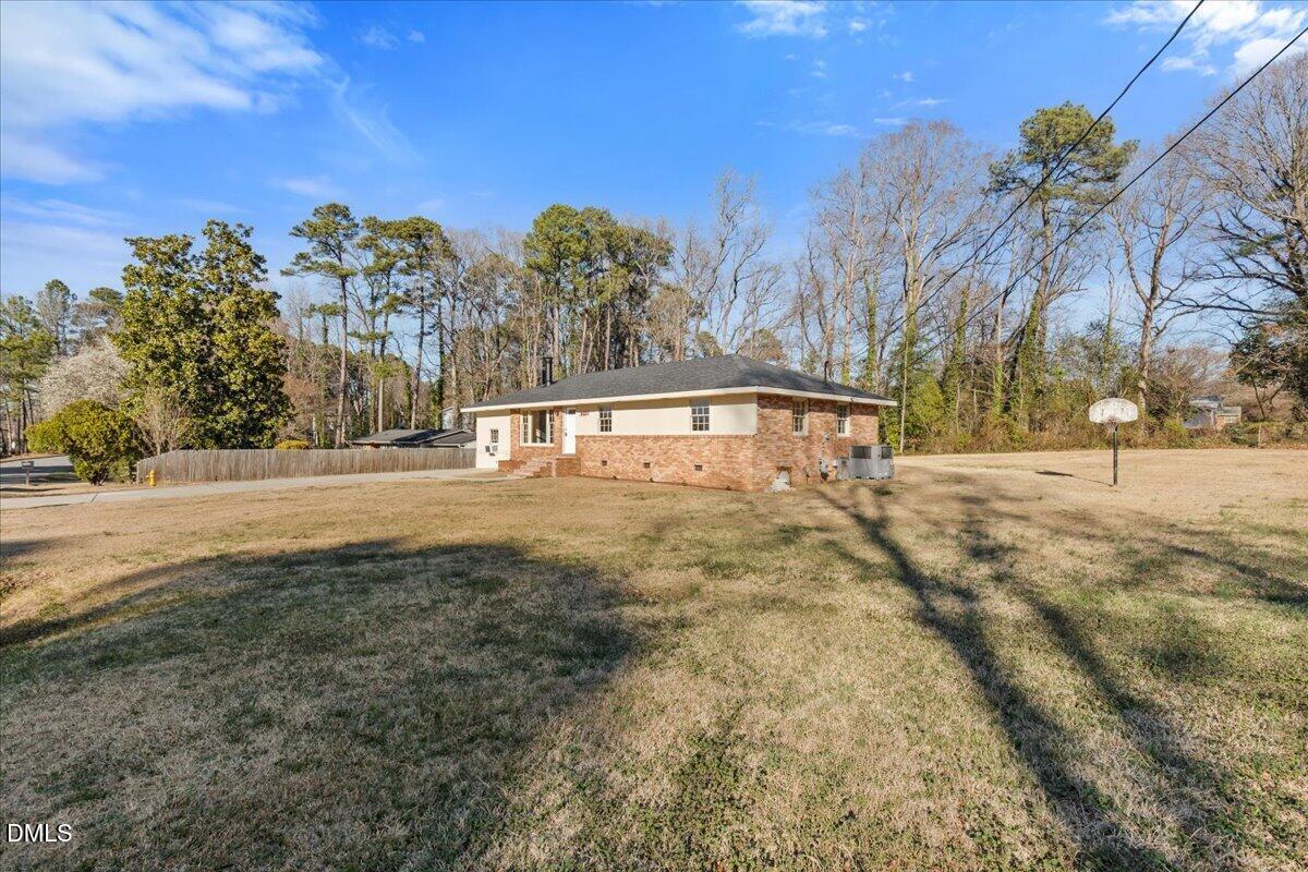 3620 Oates Drive Raleigh, NC 27604 - Photo 26 of 26 a view of outdoor space with trees in the background