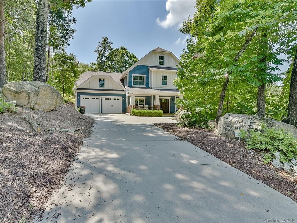 723 Harvest Pointe Drive Fort Mill, SC 29708 - Photo 1 of 47 a front view of a house with a garden