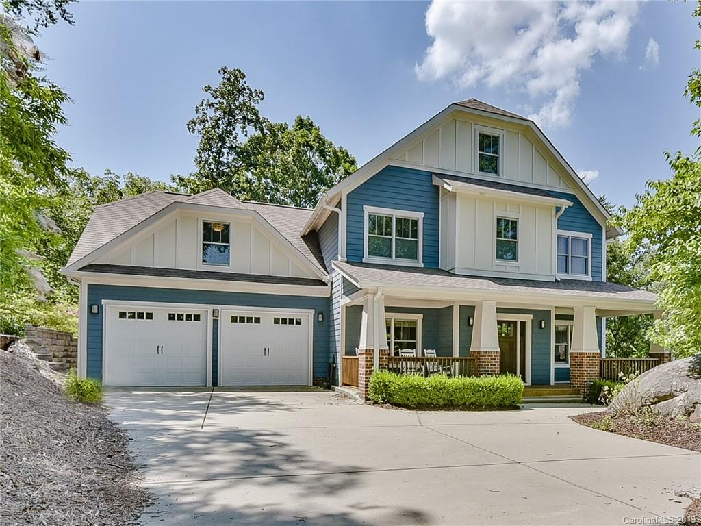 723 Harvest Pointe Drive Fort Mill, SC 29708 - Photo 2 of 47 a front view of a house with a yard and garage