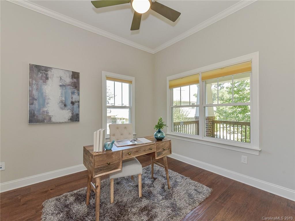 723 Harvest Pointe Drive Fort Mill, SC 29708 - Photo 11 of 47 a dining room with wooden floor and a window