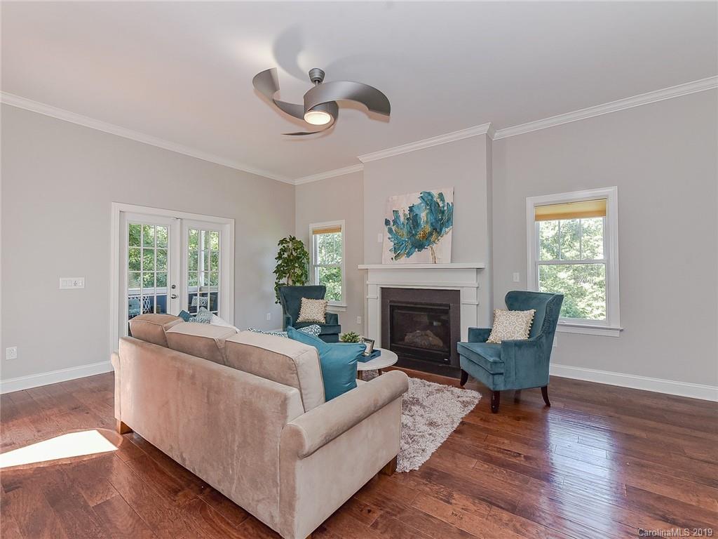 723 Harvest Pointe Drive Fort Mill, SC 29708 - Photo 13 of 47 a living room with furniture and a fireplace