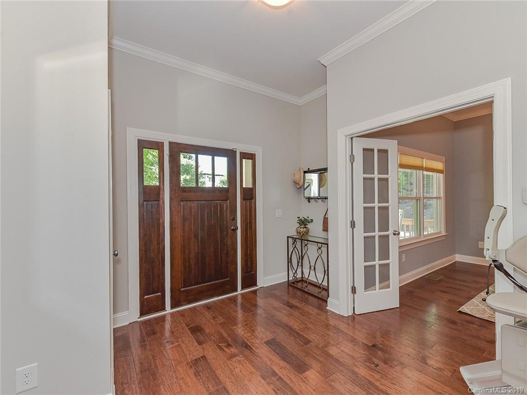 723 Harvest Pointe Drive Fort Mill, SC 29708 - Photo 8 of 47 an empty room with wooden floor and windows
