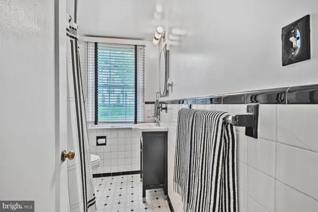 a view of a hallway with an entryway