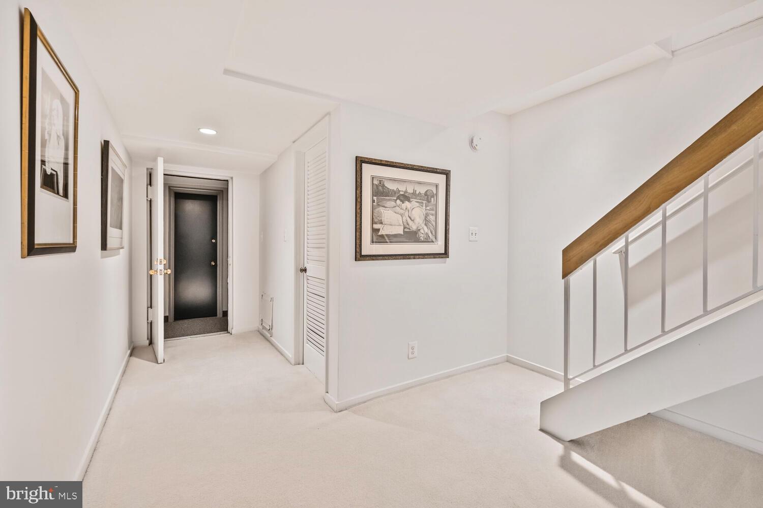 2212 Washington Avenue, Unit 102 Silver Spring, MD 20910 - Photo 15 of 27 a view of a hallway with an entryway
