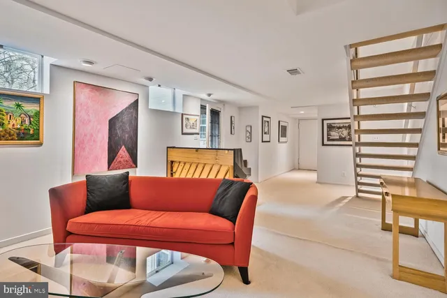 a bedroom with a bed and dresser