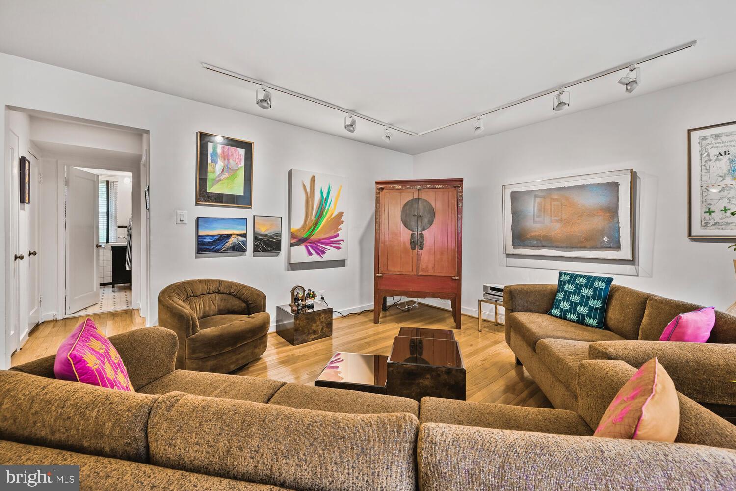 2212 Washington Avenue, Unit 102 Silver Spring, MD 20910 - Photo 8 of 27 a living room with furniture and a couch