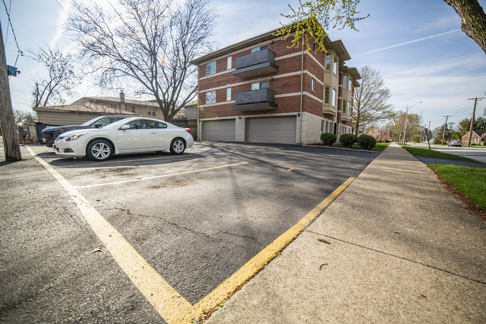 5368 West 96th Street, Unit 2S Oak Lawn, IL 60453 - Photo 14 of 18 a view of a building with a yard
