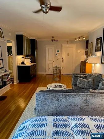 a large kitchen with stainless steel appliances granite countertop a sink and a granite counter tops